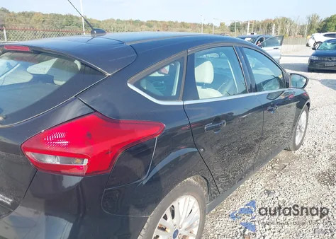 2015 Ford Focus Titanium from USA, damaged, VIN 1FADP3N24FL214270